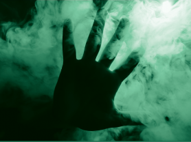 hand warding off smoke