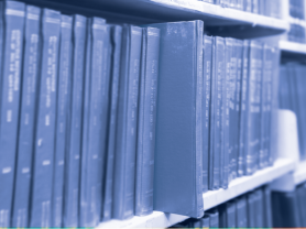 bookshelf of academic journals