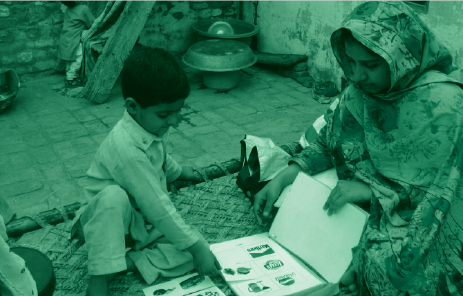 Child and woman looking at cigarette pack images